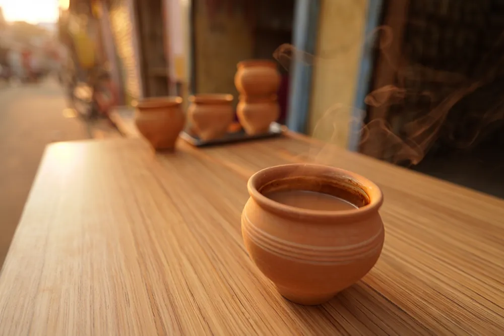 Clay kulhad cups of hot chai at an Indian roadside stall