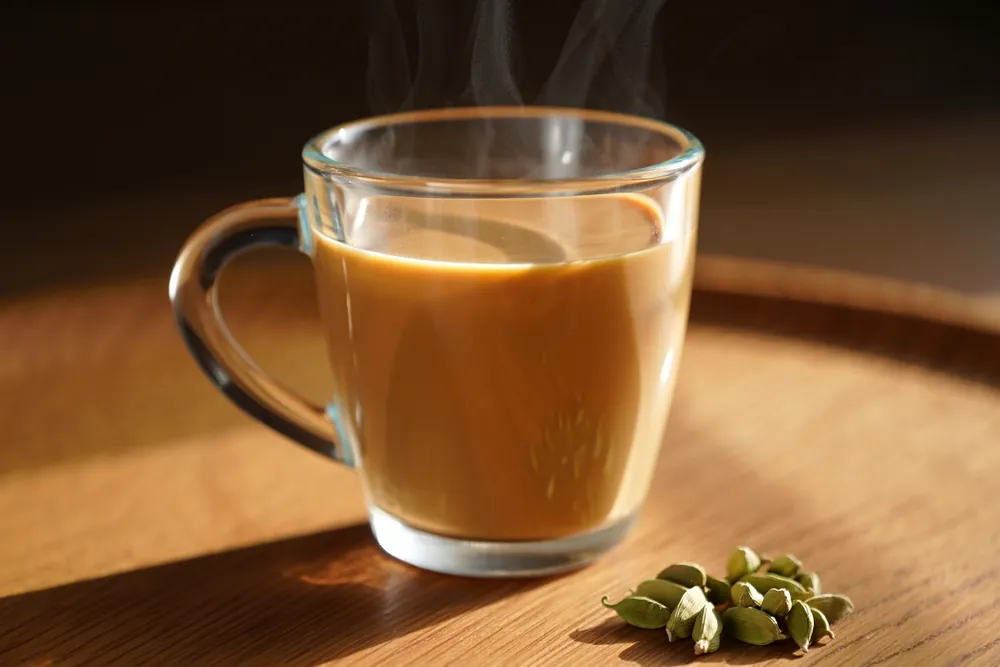 Cardamom chai with cracked green cardamom pods